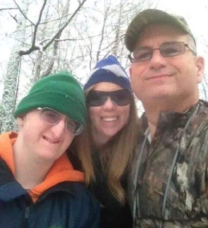 Liz, Mark, and Joey Petruzzi in the snow.