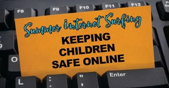 Orange card on a keyboard with "Summer Internet Surfing Keeping Children Safe Online