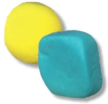 Yellow circle and blue square shapes made of modeling clay.