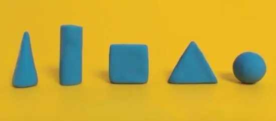 Five blue geometric shapes on a yellow background.