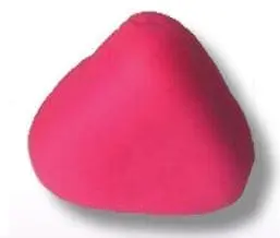 A pink clay triangle with a rounded top and flat base.