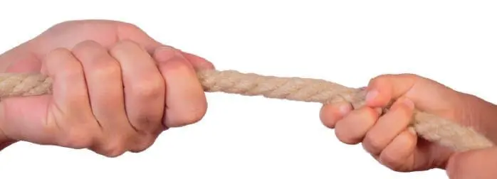 Two hands gripping a rope, pulling in opposite directions.