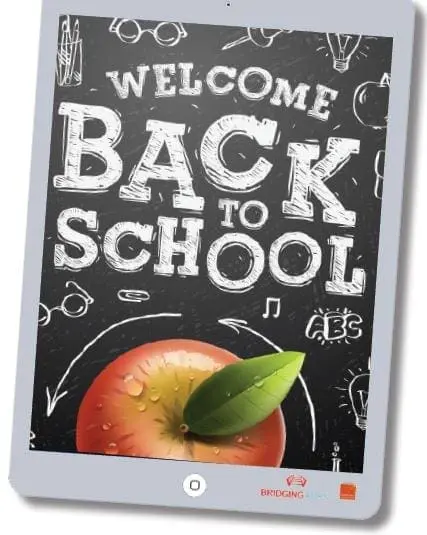 Tablet displaying "Welcome Back To School" text with apple and leaf illustration.