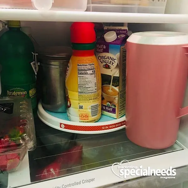 Lazy Susan with food items in a refrigerator