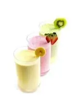 Three colorful smoothies garnished with fruit slices.