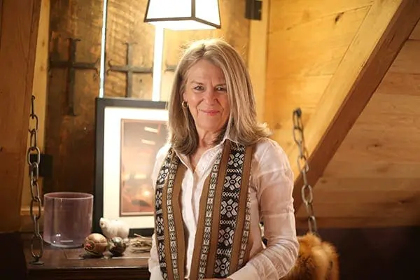 Dr. Paula Petry smiling in an office setting.