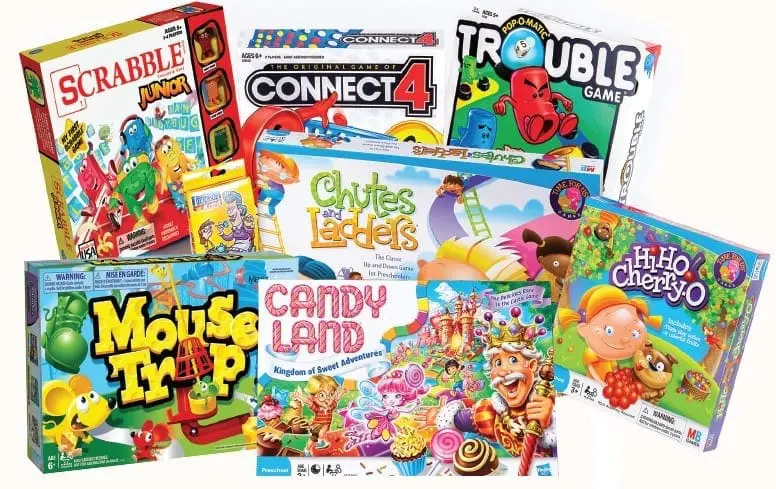 Collection of popular board games including Scrabble, Connect 4, Trouble, Candy Land, and Hi Ho Cherry-O.