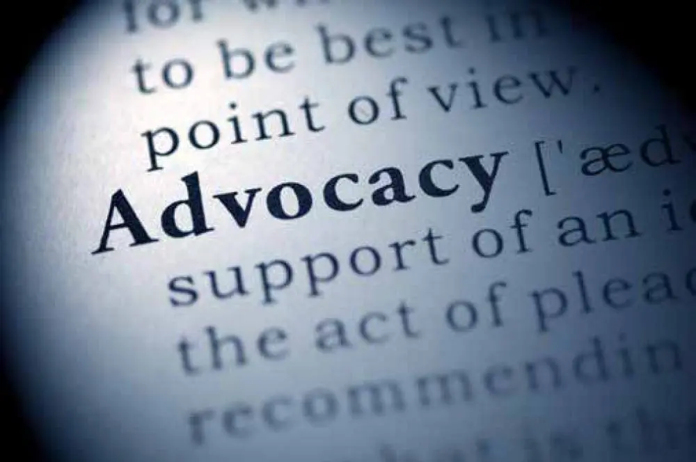 Close-up of the word "Advocacy" highlighted in a dictionary.