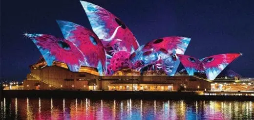 Sydney Opera House illuminated with colorful lights during Vivid Sydney.
