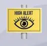 Yellow sign with black text "HIGH ALERT" and an eye symbol