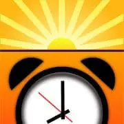 Alarm clock with a rising sun above it.
