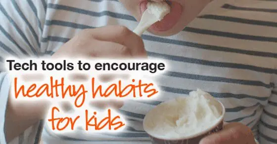 A child eats from a cup with a spoon, text overlayed reads "Tech tools to encourage healthy habits for kids.