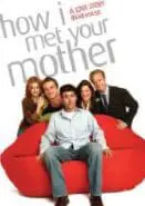 The cast of How I Met Your Mother sits on a red couch.