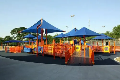 Playground Without Limits in Houston, Texas with blue awnings and orange ramps.
