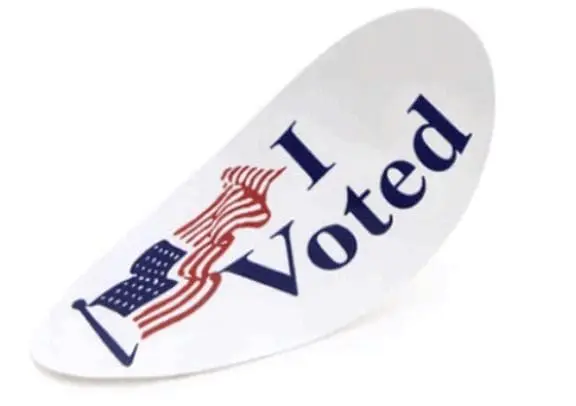 I Voted" sticker with an American flag
