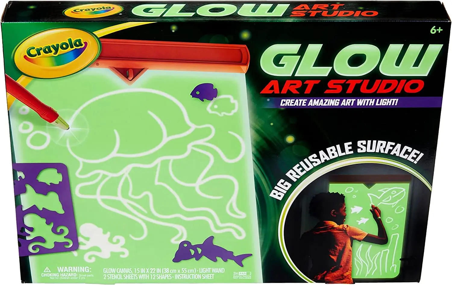 Crayola Glow Art Studio box with a child drawing on a light-up surface