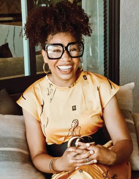 Dr. Cherina Williams smiling while wearing large glasses.