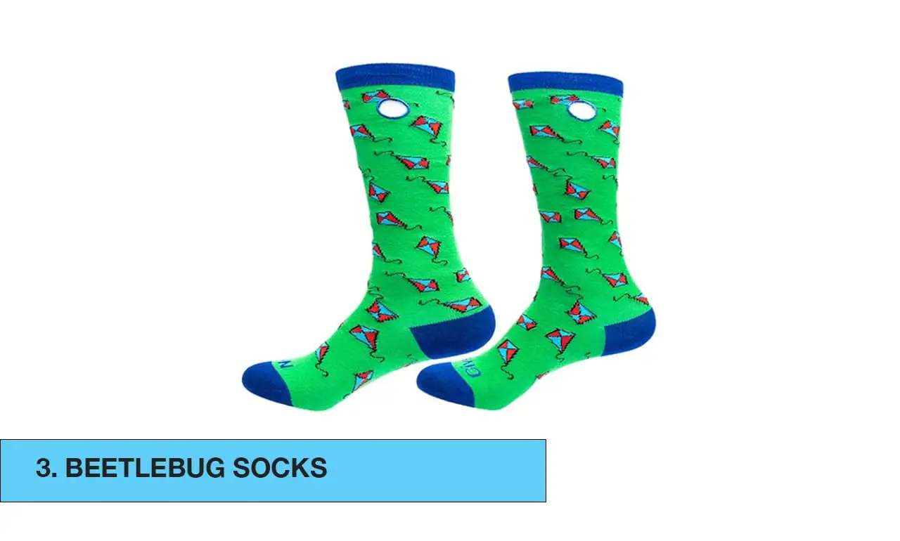 Green socks with a repeating beetle pattern and blue accents.