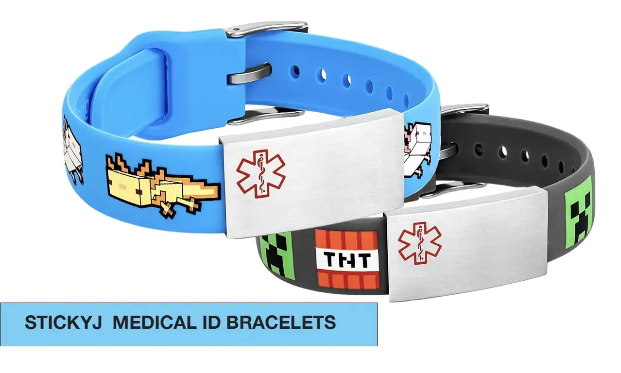 Two medical ID bracelets, one blue with axolotl graphics and one black with TNT graphics.