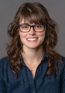 Dr. Emily Gianetti smiling at the camera.