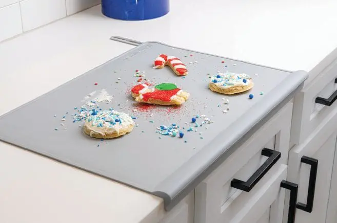 The Table Tyke XL mat with decorated cookies and sprinkles