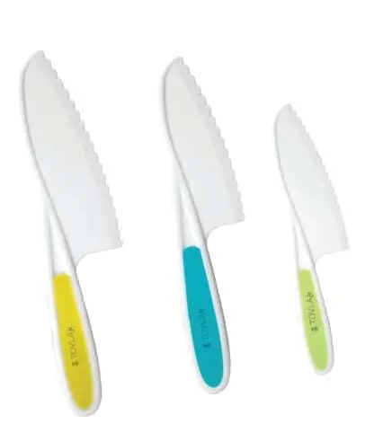 Three Tovla Jr. knives with yellow, blue, and green handles.