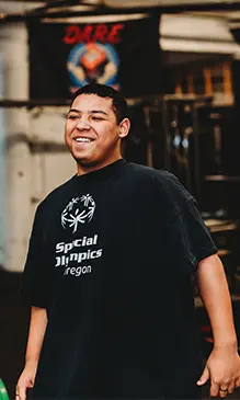 Gabriel wearing a Special Olympics Oregon t-shirt