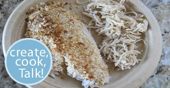 Panko crusted fish with shredded noodles on a plate