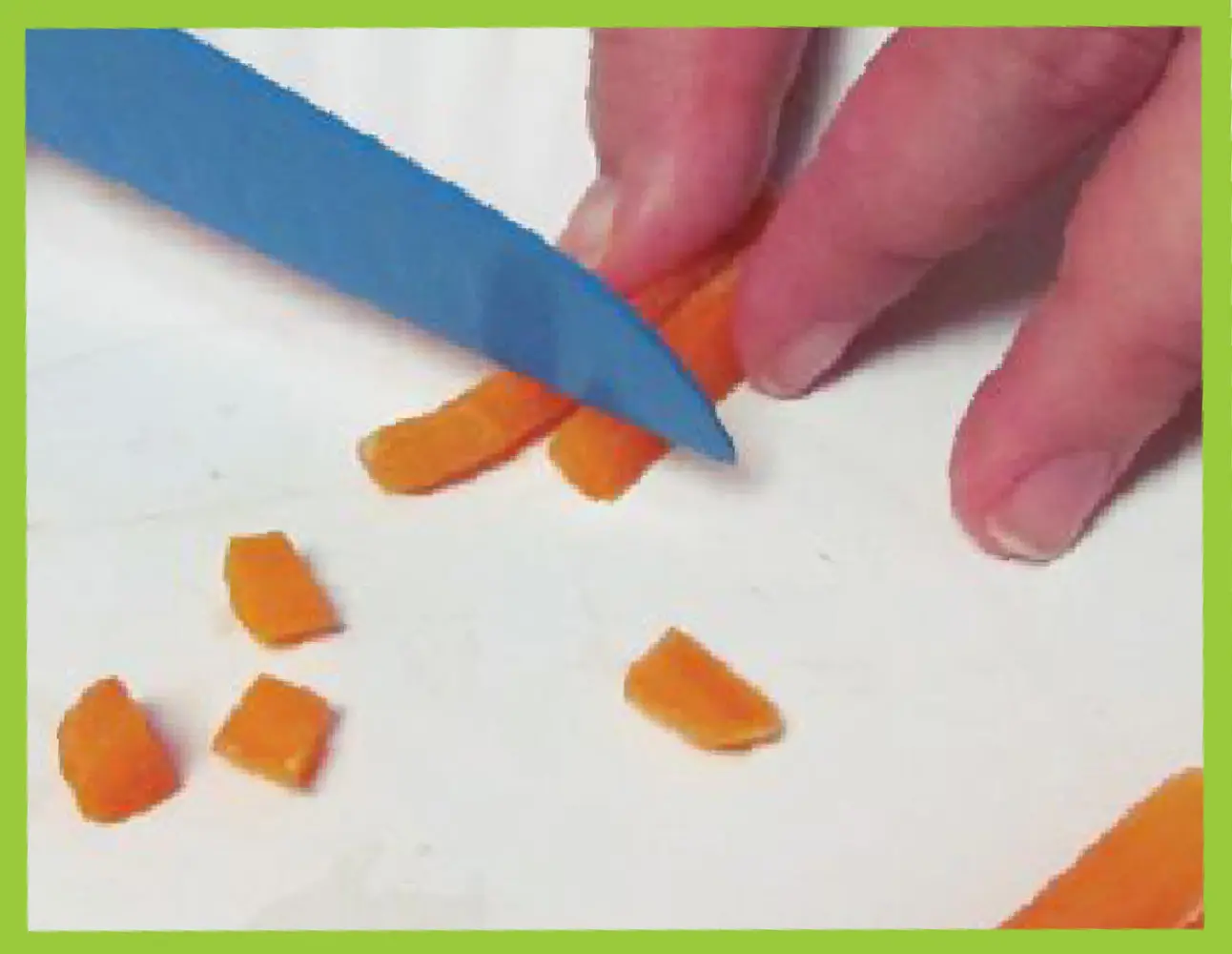 Cutting baby carrots into small pieces for deviled egg chicks