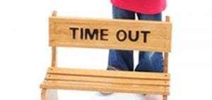 Wooden bench with "TIME OUT" written on it