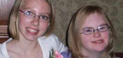 Kylie Gotzfried and a friend smile for the camera.