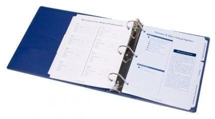 Blue binder open to pages with lists and checkboxes.