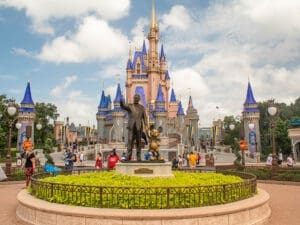 Partners statue of Walt Disney and Mickey Mouse in front of Cinderella Castle