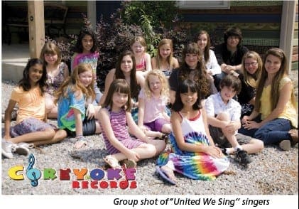 Group of young singers for "United We Sing" pose for a photo.