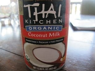 Can of Thai Kitchen Organic Coconut Milk with a close-up view of the label.
