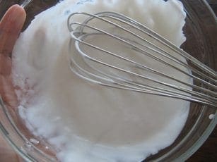 Whisk blending coconut milk, sugar, and vanilla in a bowl.