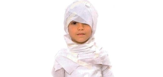 Child dressed as a mummy.