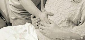 Two people holding hands.
