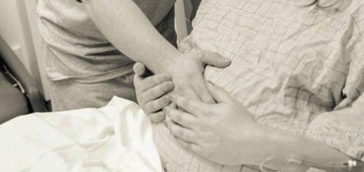 Two people holding hands.