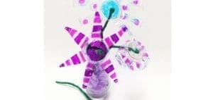 Shrinking cup flower sculptures decorated with purple and pink stripes.