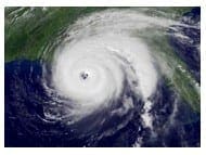 Satellite view of a large swirling hurricane reminding readers to prepare food supplies for tropical storm season.