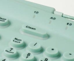 Waterproof CleanKey keyboard featuring a dedicated button for easy sanitization to help reduce germ spread in classrooms.