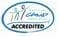 Oval logo with text "The Choice Accredited