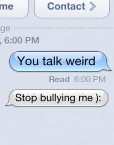 Text message conversation where one person says "You talk weird" and the other replies "Stop bullying me :)".