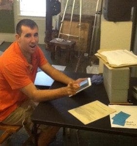 Student using an iPad Mini to assist with work tasks.