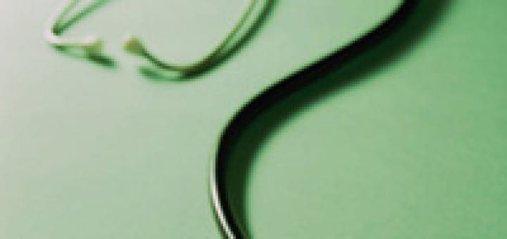 Stethoscope shaped into a question mark, symbolizing the uncertainty of finding health coverage after job loss.