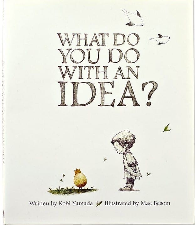 Book cover for "What Do You Do With An Idea?" featuring a boy and a pear-like creature.