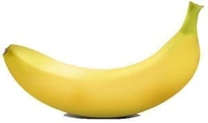 A yellow banana with a green stem against a white background.
