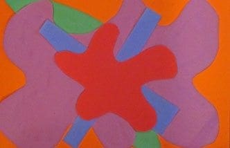 A collage of colorful paper shapes resembles a stylized flower.