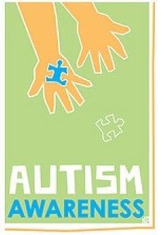 Two hands hold a blue puzzle piece with the words "AUTISM AWARENESS" below.
